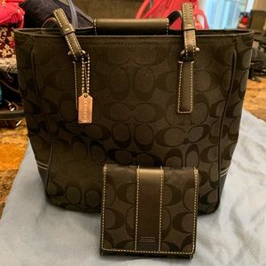 A small Coach tote with matching is wallet